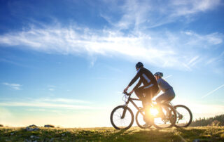 a couple on a mountain bike tour in Maui